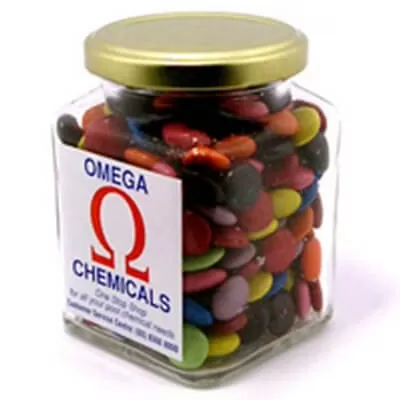 branded 170g Chocolate Beans Packed in Glass Square Jars, from our range of promotional Branded Chocolates
