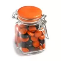 branded 80g Chocolate Beans Packed in Glass Clip Lock Jars, from our range of promotional Branded Chocolates