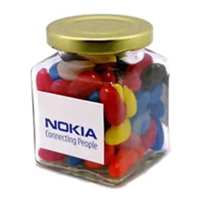 branded 170g Jelly Beans Packed in Glass Square Jars, from our range of promotional Promotional Jelly Beans