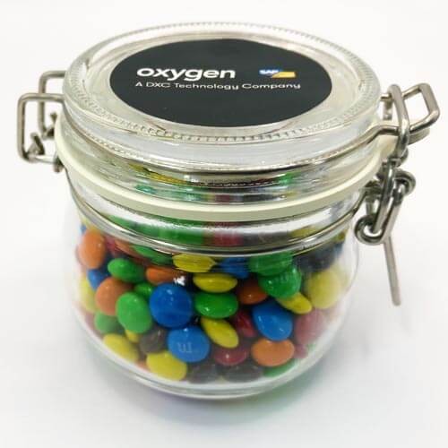 branded 130g Mini M&amp;Ms Packed in Small Clip Lock Jars, from our range of promotional M&amp;M's